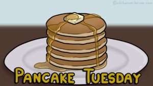 メープルシロップを垂らしたパンケーキ5枚重ねと、「Pancake Tuesday」という表記